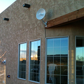 AlignTec technician performing a site survey for wireless internet installation