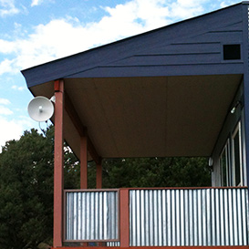 AlignTec technician completing indoor network setup and router configuration